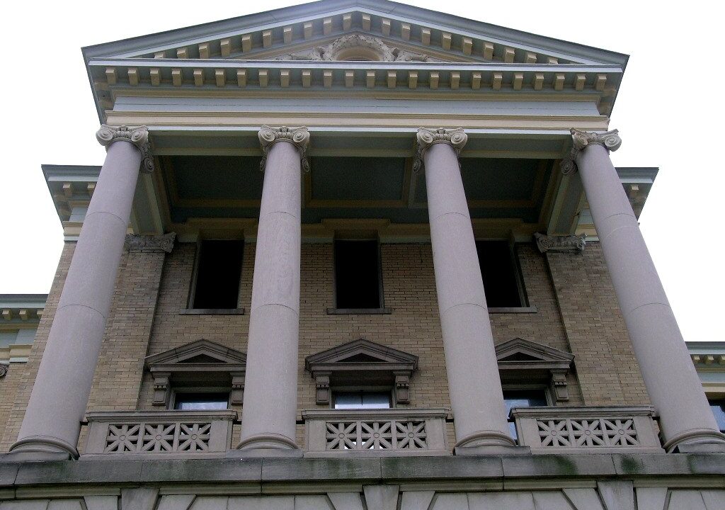 Stone columns at the front of a county courthouse