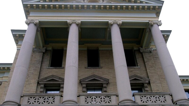 Stone columns at the front of a county courthouse