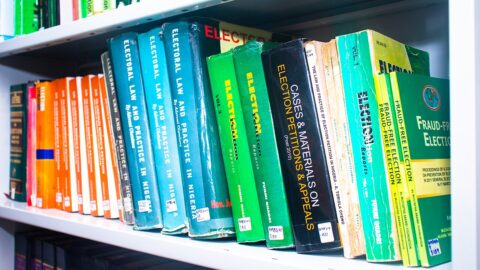 Rows of law books on shelves in a law library