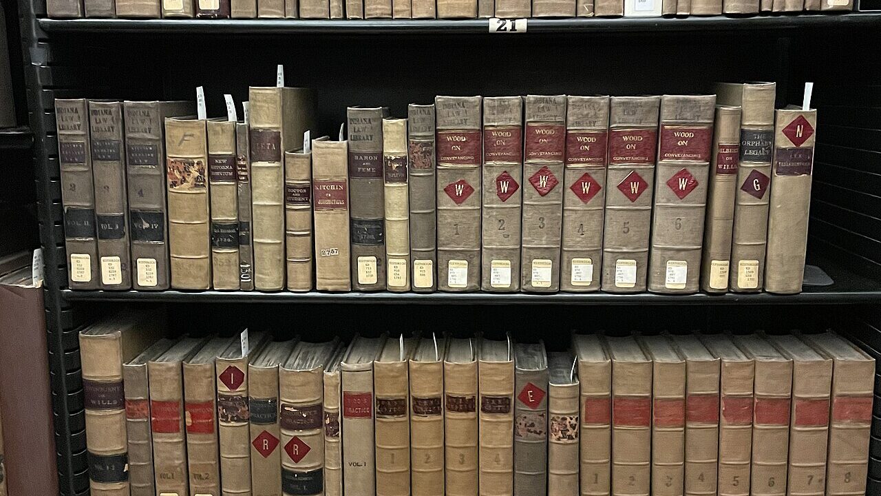 Rare legal volumes on a shelf in the Indiana Supreme Court Law Library