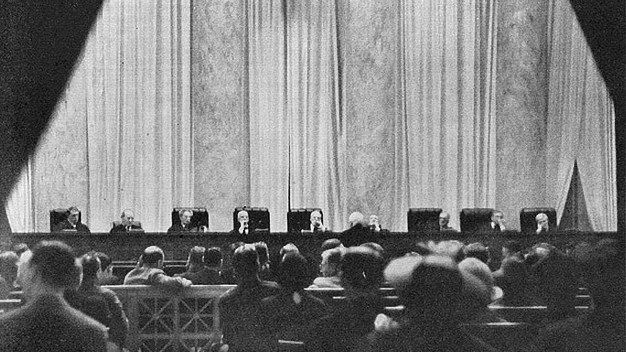 Historic view of the Supreme Court building interior during a session in 1937