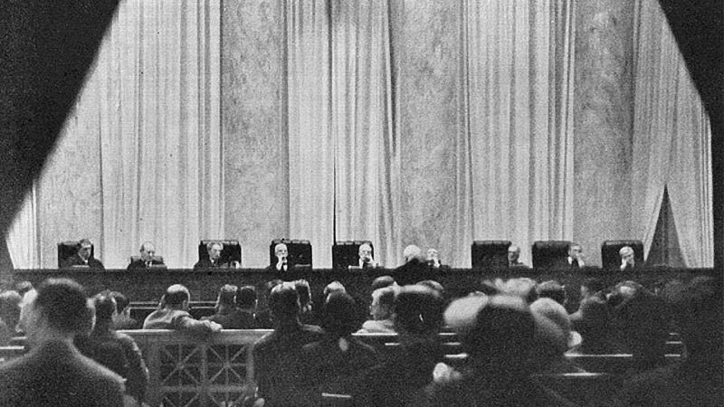 Historic view of the Supreme Court building interior during a session in 1937
