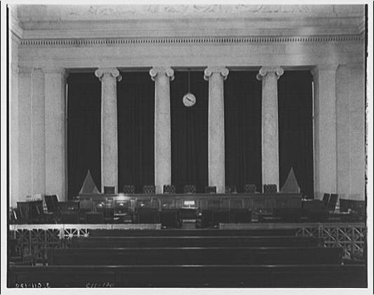 Interior of the United States Supreme Court courtroom viewed from the rear